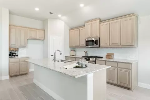 Kitchen - 112 Sweetwater Dr, Commerce, TX 75428 photo 2 of 4
