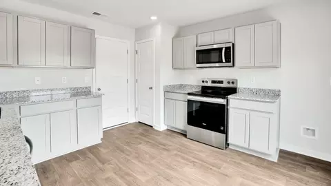 Kitchen - 1213 Skystone Loop NE, Supply, NC 28462 photo 3 of 10