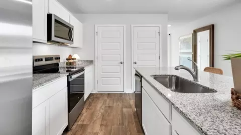 Kitchen - 1213 Skystone Loop NE, Supply, NC 28462 photo 9 of 10