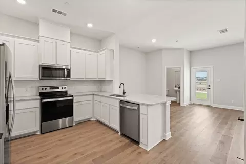 Kitchen - 766 Carson Ln, Pilot Point, TX 76258 photo 2 of 2