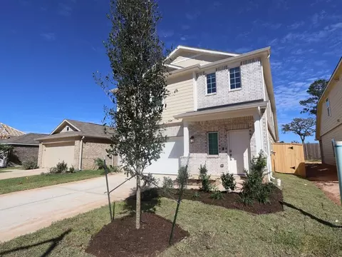 Exterior - 673 Falling Cave Dr, Willis, TX 77378 photo 3 of 7