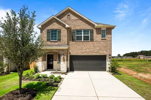 Exterior - 673 Falling Cave Dr, Willis, TX 77378 photo 2 of 4