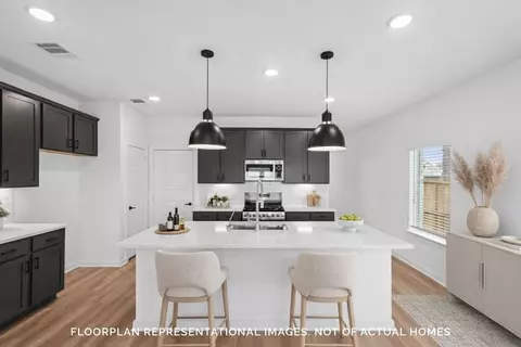 Kitchen - 673 Falling Cave Dr, Willis, TX 77378 photo 1 of 3