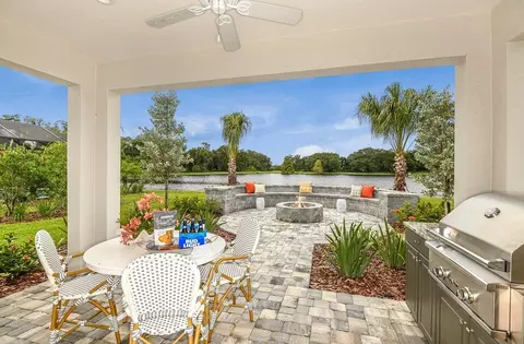 Exterior - 10025 Hammock Brook Dr, Parrish, FL 34219 photo 4 of 14