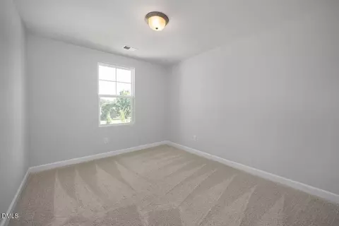 Bedroom - 3837 Well Fleet Dr, Willow Spring, NC 27592 photo 3 of 7