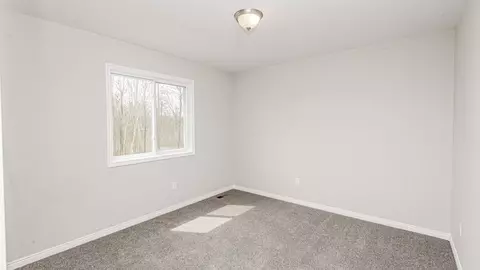 Bedroom - 930 E Drahner Rd, Oxford, MI 48371 photo 6 of 9