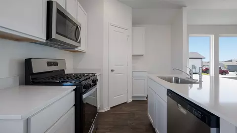 Kitchen - 1122 Celosia Loop, Kyle, TX 78640 photo 3 of 9