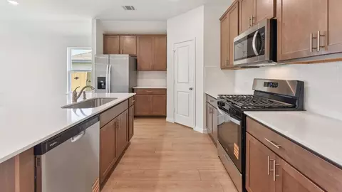 Kitchen - 13407 Eppright Trce, Manor, TX 78653 photo 2 of 5