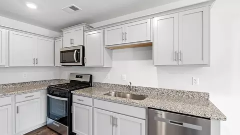 Kitchen - 1104 Golf Dr, Roebuck, SC 29376 photo 3 of 10