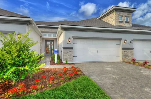 Exterior - 100 Plantation Bay Dr, Ormond Beach, FL 32174 photo 4 of 9