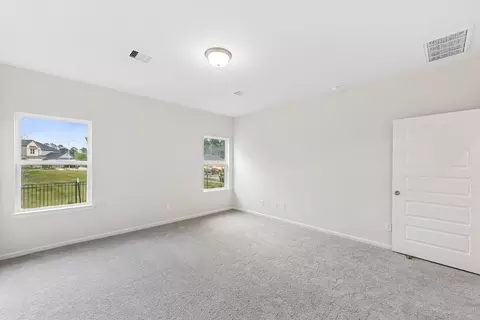 Bedroom - 14461 Feather Moss Dr, Splendora, TX 77372 photo 3 of 13