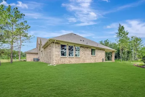 Exterior - 1128 Dws Pass, Conroe, TX 77306 photo 10 of 11