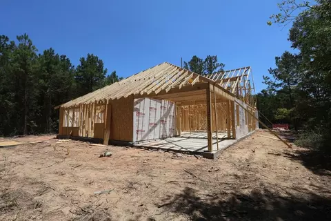 Exterior - 1128 Dws Pass, Conroe, TX 77306 photo 4 of 11