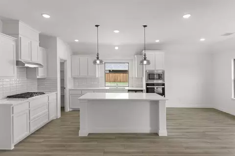 Kitchen - 601 Trinity St, Van Alstyne, TX 75495 photo 2 of 6