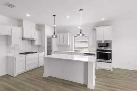 Kitchen - 601 Trinity St, Van Alstyne, TX 75495 photo 3 of 6