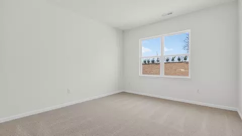 Bedroom - 910 Comice Pear Way, Willow Spring, NC 27592 photo 2 of 13