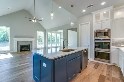 Kitchen - 910 Shooting Star Dr, Prosper, TX 75078 photo 4 of 9
