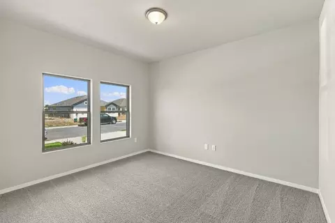 Bedroom - 13801 Ryan Range Ln, Elgin, TX 78621 photo 5 of 13