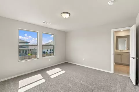 Bedroom - 13801 Ryan Range Ln, Elgin, TX 78621 photo 3 of 13