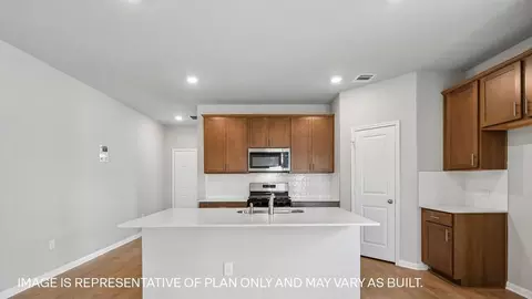 Kitchen - 13407 Eppright Trce, Manor, TX 78653 photo 3 of 7