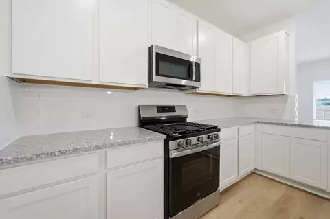 Kitchen - 14128 Biscayne Trl, Conroe, TX 77303 photo 3 of 10