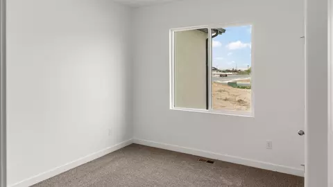 Bedroom - 1369 W 2350 S #12, Perry, UT 84302 photo 3 of 11