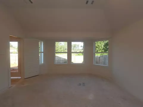 Living - 702 Falling Cave Dr, Willis, TX 77378 photo 2 of 2
