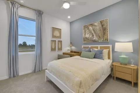 Bedroom - 8909 Quest Seeker Trl, Parrish, FL 34219 photo 7 of 12