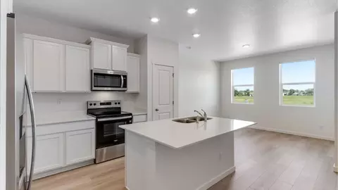 Kitchen - 2254 Crosswind St, Fort Lupton, CO 80621 photo 4 of 5