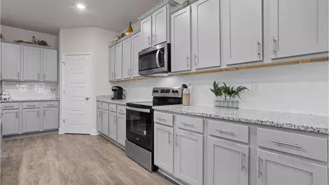 Kitchen - 13320 Sarsen Loop, Vancleave, MS 39565 photo 3 of 5