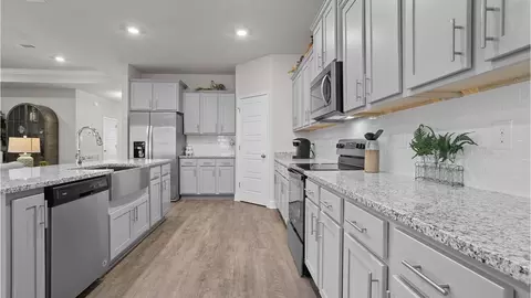 Kitchen - 13320 Sarsen Loop, Vancleave, MS 39565 photo 2 of 5
