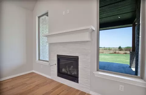 Living - 932 Hydrangea Way, Edmond, OK 73034 photo 11 of 21