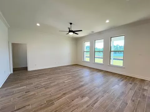 Living - 613 Ramsey Spring Dr, Covington, LA 70435 photo 2 of 4