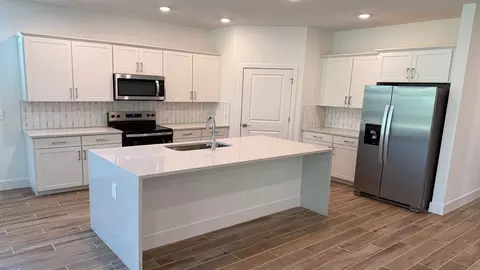 Kitchen - 6551 SE Park Trace Dr, Stuart, FL 34997 photo 1 of 8