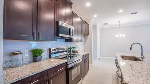 Kitchen - 2214 Elegant Mnr Cir, Edgewater, FL 32141 photo 5 of 7