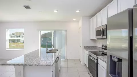 Kitchen - 2214 Elegant Mnr Cir, Edgewater, FL 32141 photo 2 of 3
