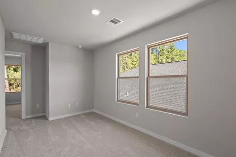 Bedroom - 12048 Moonlight Path Dr, Conroe, TX 77304 photo 4 of 12