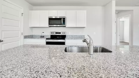Kitchen - 1213 Skystone Loop NE, Supply, NC 28462 photo 3 of 5