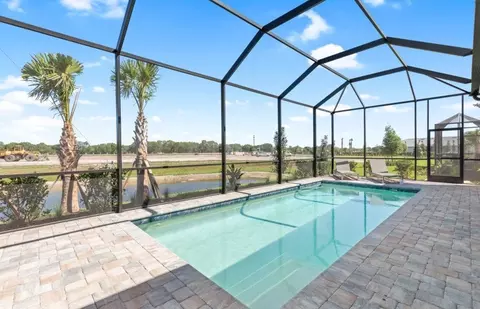 Exterior - 10000 SW Legacy Dr, Stuart, FL 34997 photo 5 of 12