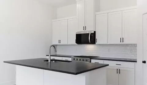 Kitchen - 717 Riggs Ave, Springdale, AR 72762 photo 2 of 2