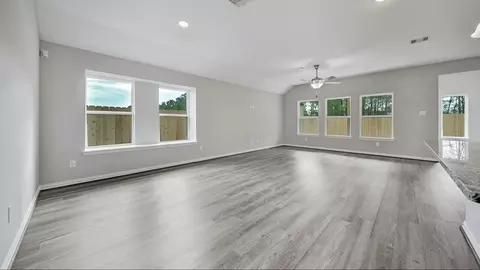 Living - 206 Painters Ridge Ct, Willis, TX 77318 photo 1 of 3