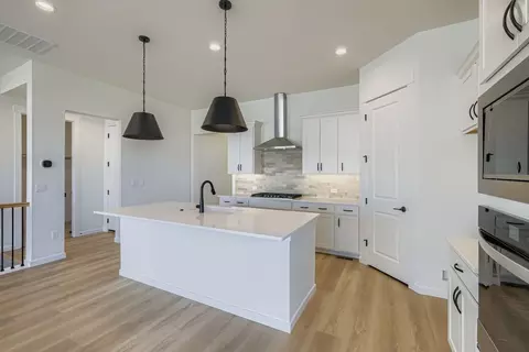 Kitchen - 2093 Falling Leaf, Windsor, CO 80550 photo 3 of 9