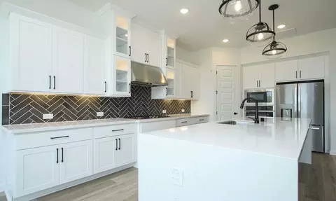 Kitchen - 930 Shooting Star Dr, Prosper, TX 75078 photo 2 of 10