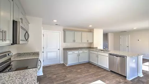 Kitchen - 1104 Golf Dr, Roebuck, SC 29376 photo 2 of 7