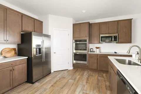 Kitchen - 18 River Walk Farm Pkwy, Covington, GA 30014 photo 2 of 2