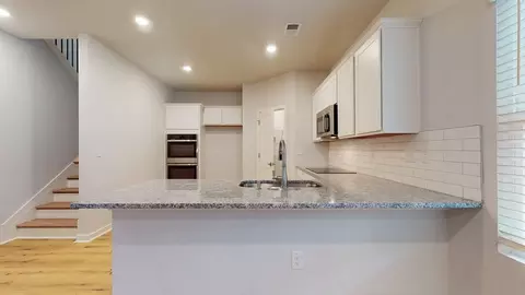 Kitchen - 94 Jacoby Dr, Fairburn, GA 30213 photo 6 of 9
