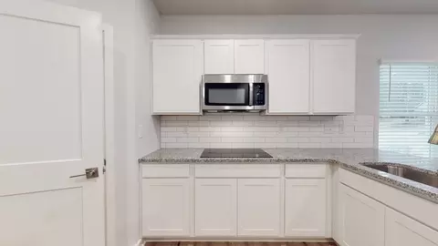 Kitchen - 94 Jacoby Dr, Fairburn, GA 30213 photo 5 of 9