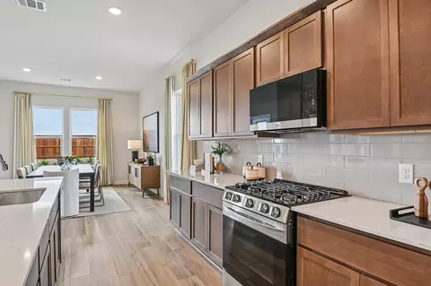 Kitchen - 715 Carson Dr, Forney, TX 75126 photo 10 of 13