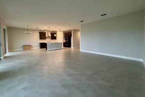 Living - 5328 Teirgarten St, Saint Cloud, FL 34771 photo 5 of 8