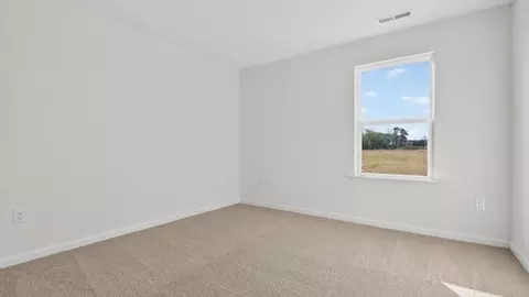 Bedroom - 836 Comice Pear Way, Willow Spring, NC 27592 photo 2 of 11